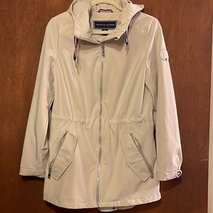 Tommy Hilfiger hooded zip jacket with adjustable waist.